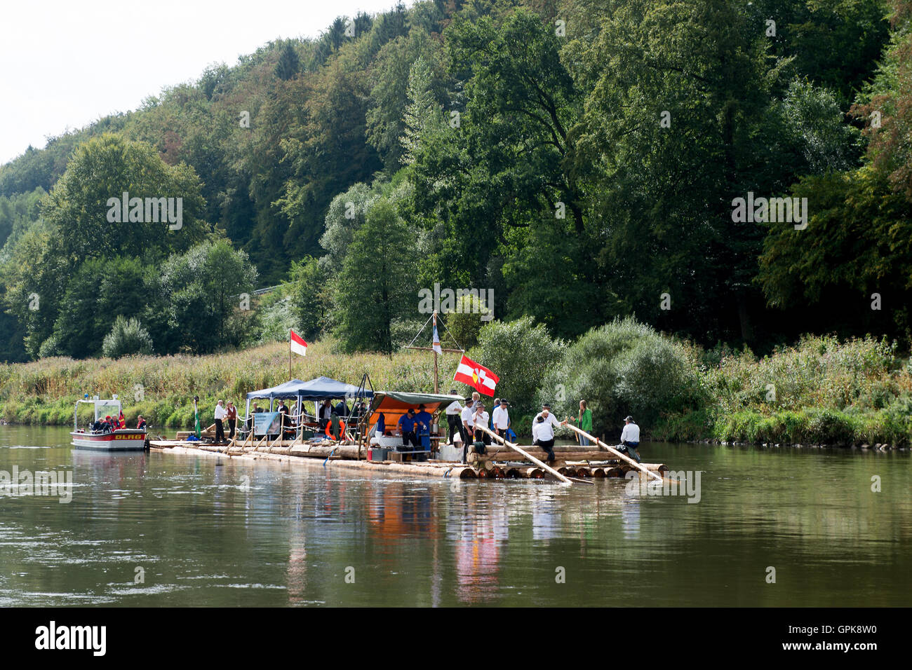 Weser raftsmen on a reconstructed raft on Weser river near Bursfelde ...