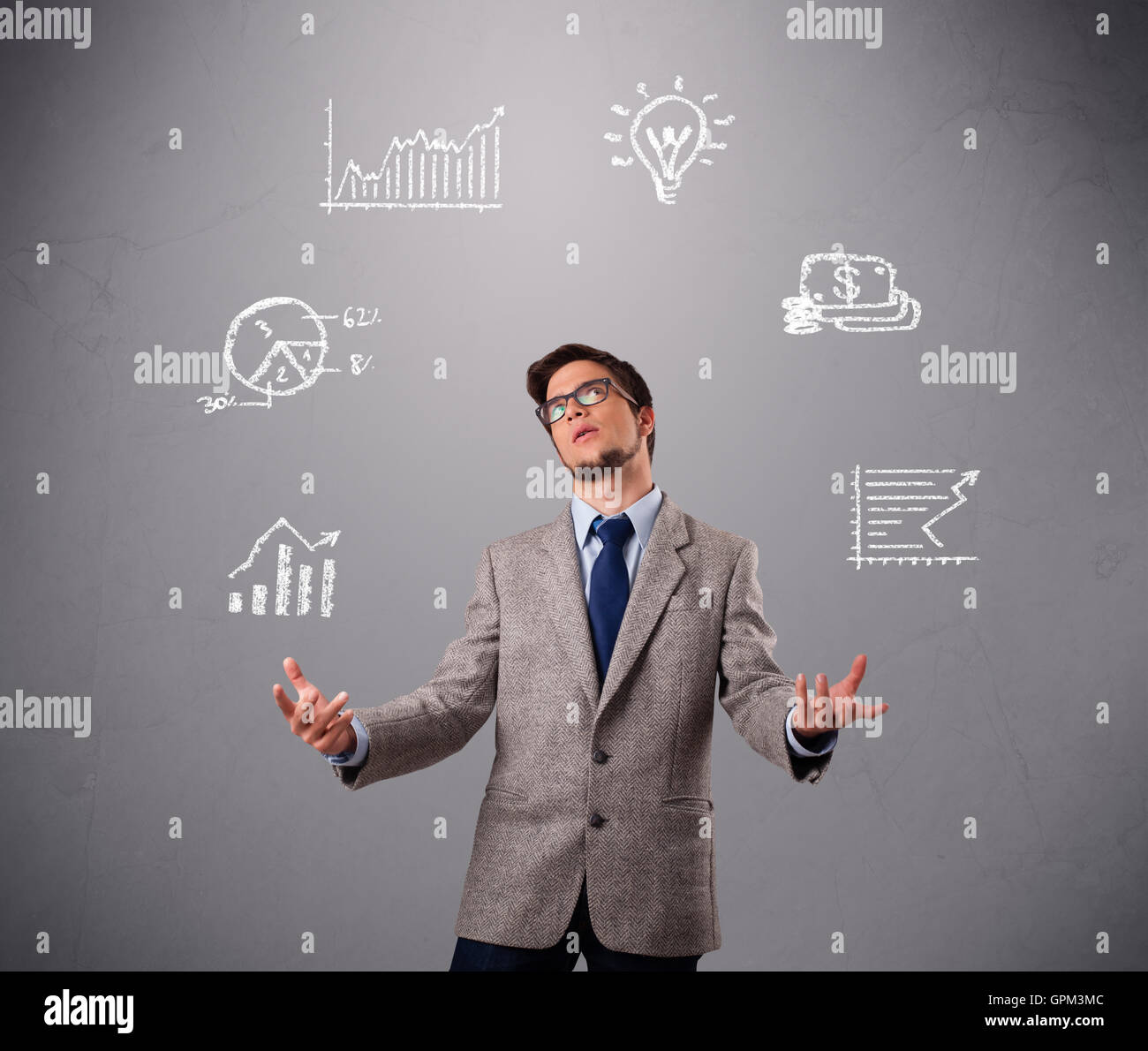 young boy juggling with statistics and graphs Stock Photo Alamy