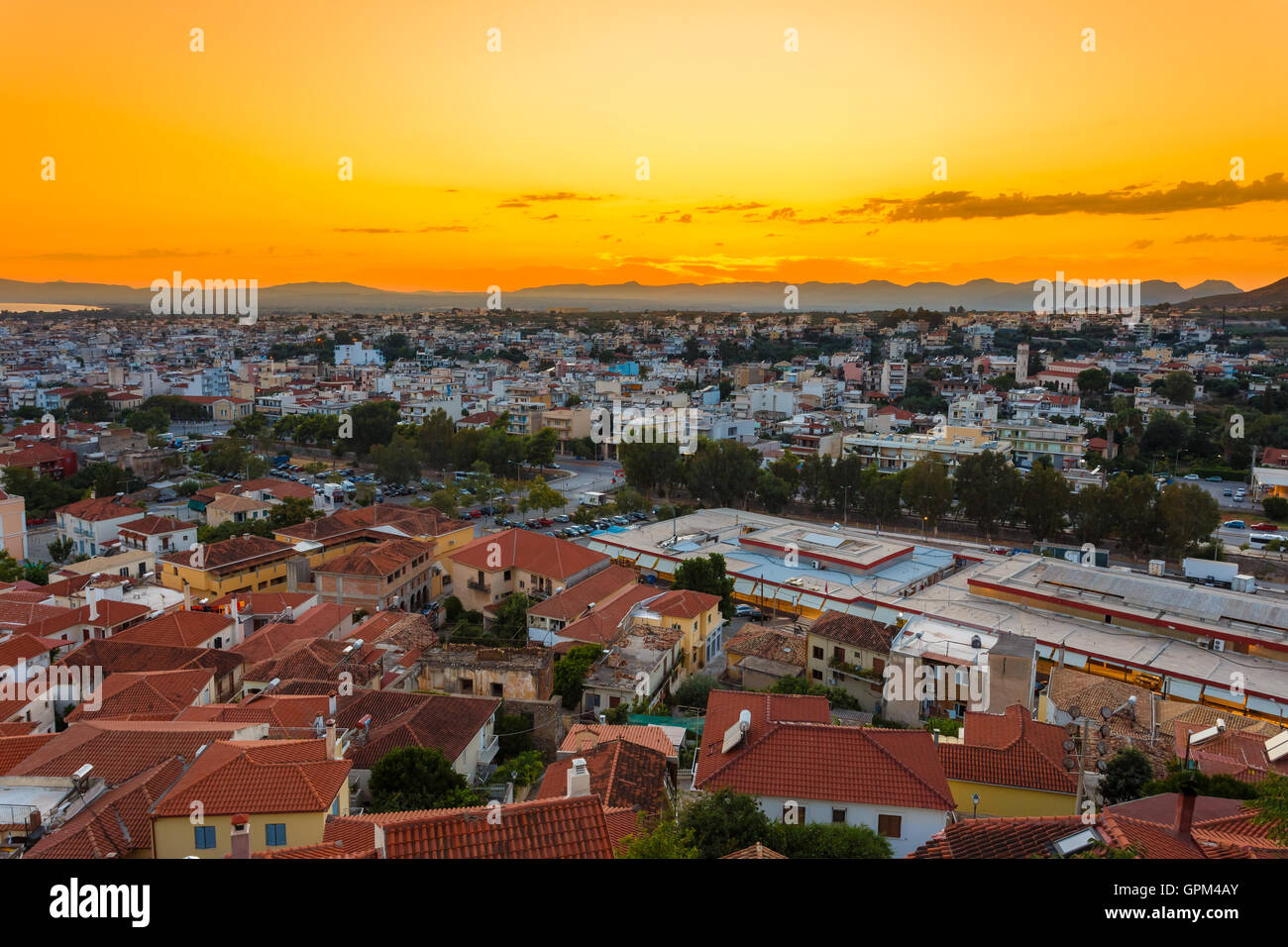 Kalamata city skyline in the evening after sunset with city lights in the foreground Stock Photo