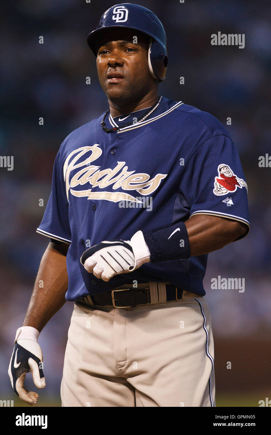 August 17, 2010; Chicago, IL, USA; San Diego Padres third baseman Miguel  Tejada (10) stands on first base after a walk during the first inning  against the Chicago Cubs at Wrigley Field.