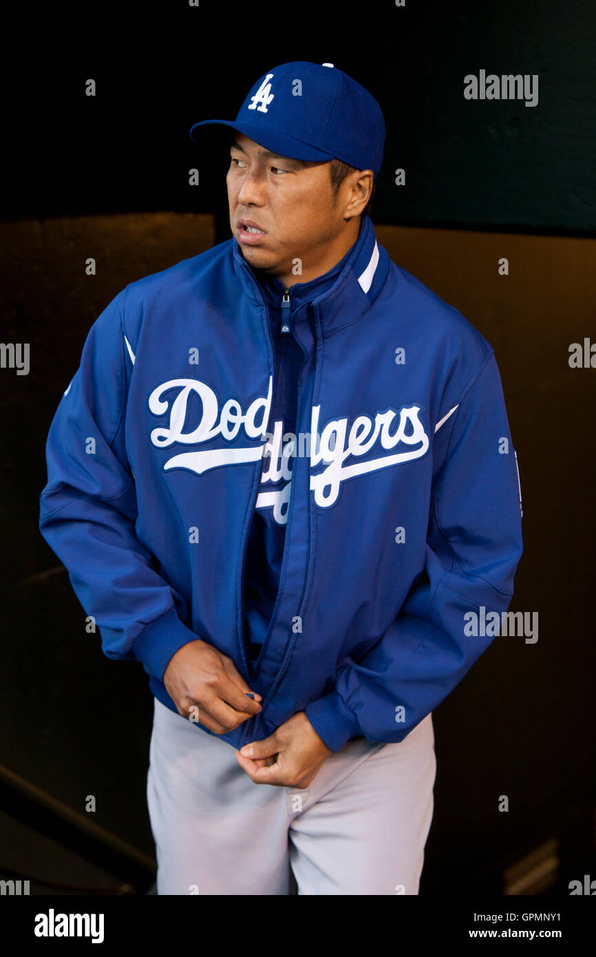 September 14, 2010; San Francisco, CA, USA;  Los Angeles Dodgers shortstop Chin-lung Hu (60) enters the dugout before the game against the San Francisco Giants at AT&T Park. Los Angeles defeated San Francisco 1-0. Stock Photo