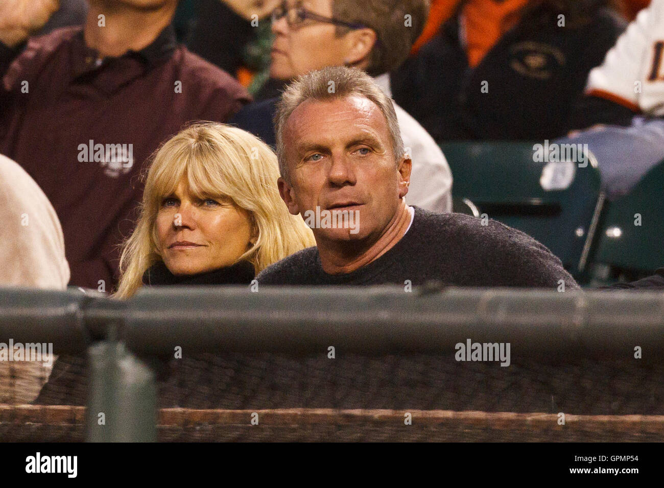 September 15, 2010; San Francisco, CA, USA;  Former San Francisco 49ers quarterback Joe Montana (right) and his wife Jennifer Montana (left) watch the game between the San Francisco Giants and the Los Angeles Dodgers with during the first inning at AT&T P Stock Photo