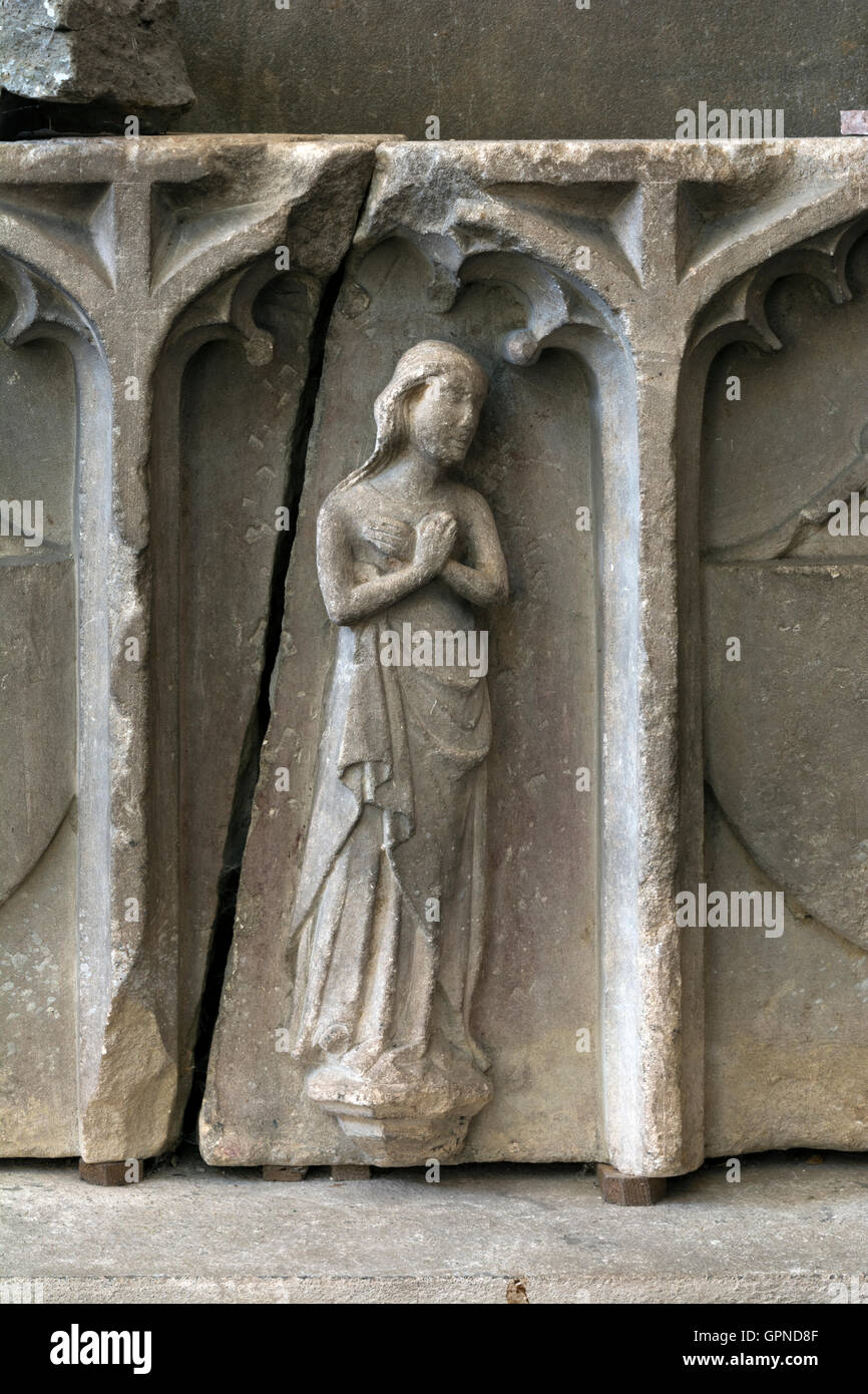 Carved stone relic in Little Malvern Priory, Worcestershire, England, UK Stock Photo