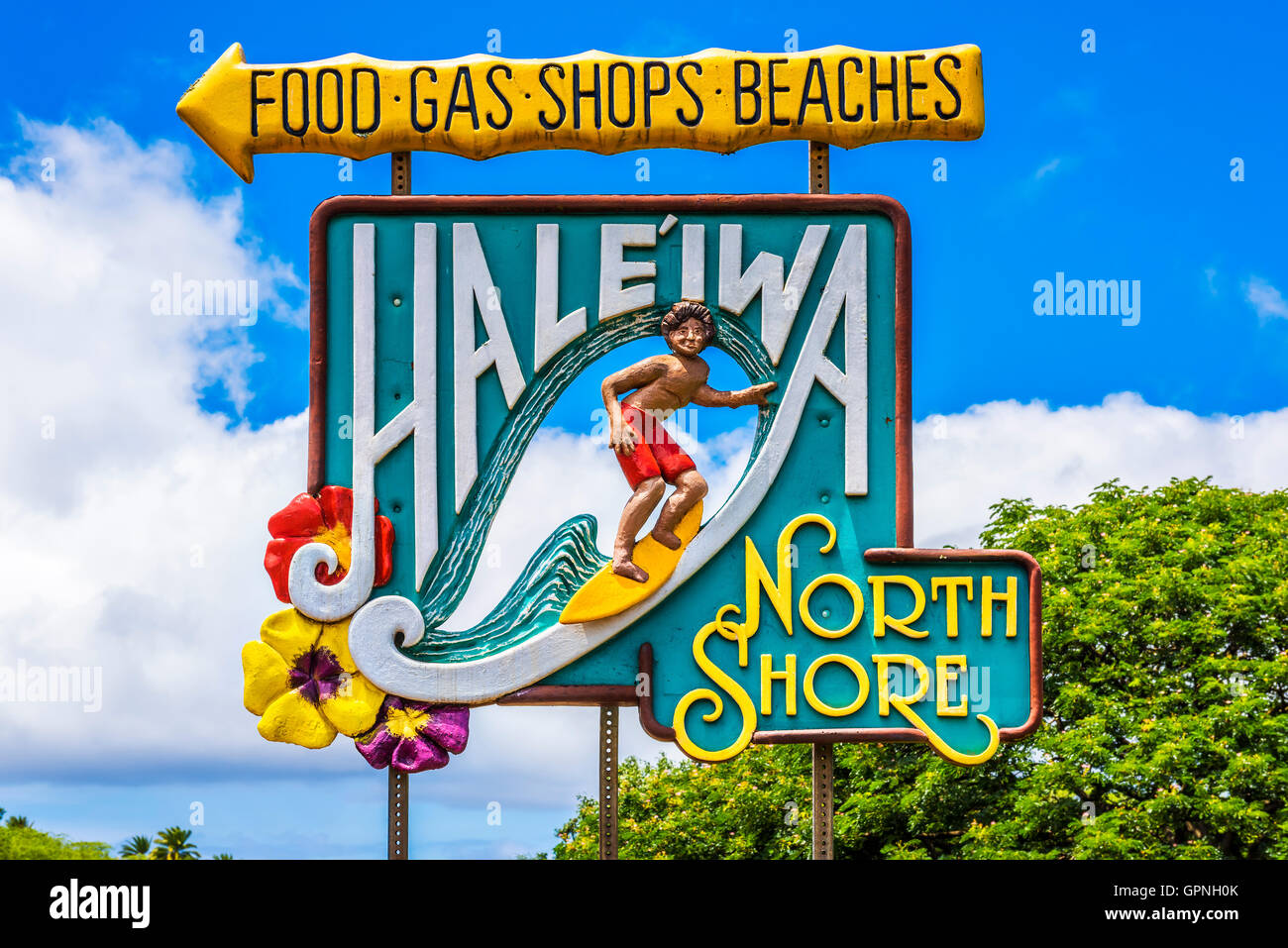 Road sign for the town of Haleiwa  famed as a surfing mecca on the North Shore of the Hawaiian island of Oahu, USA Stock Photo