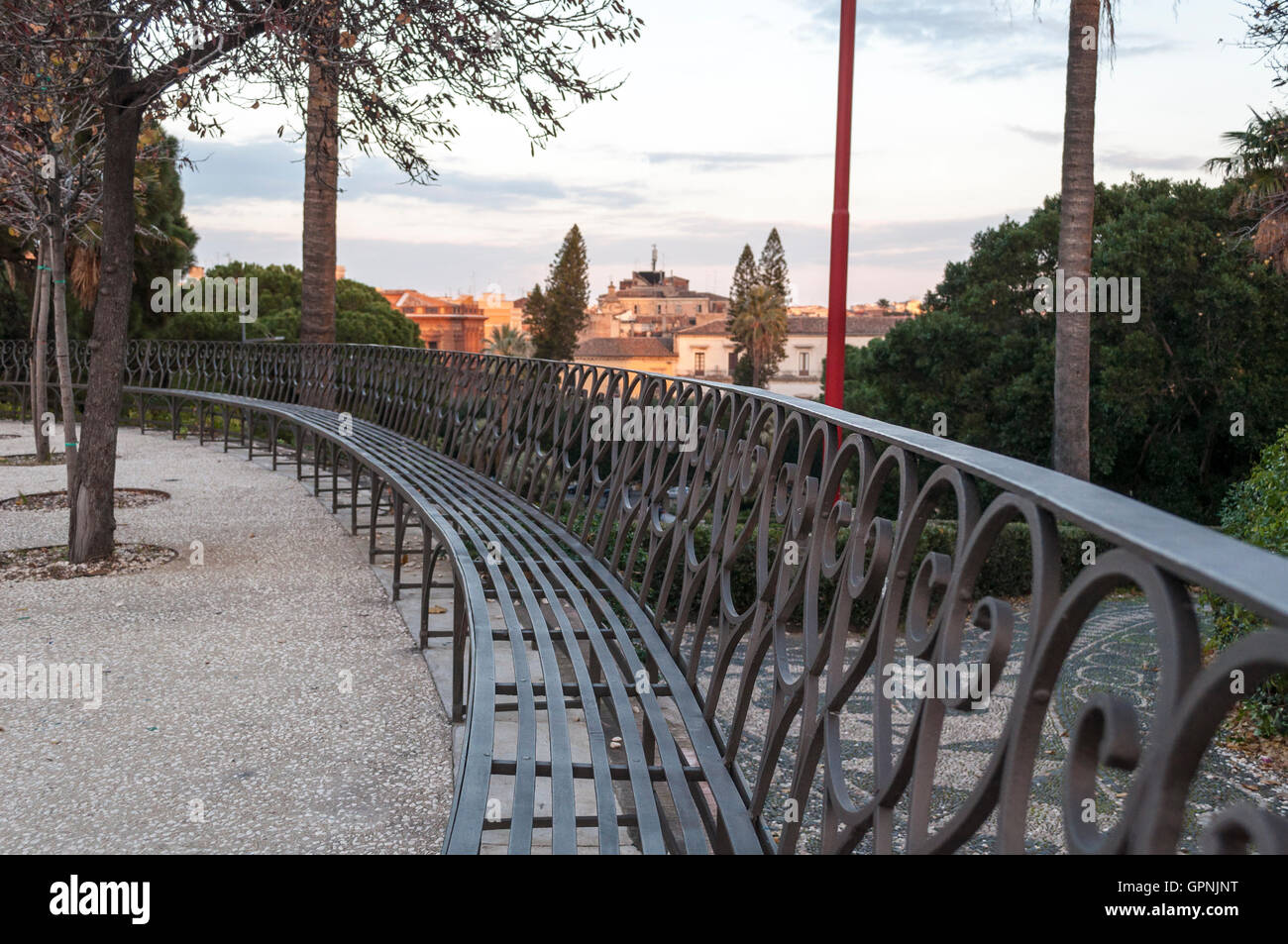 Bench in Bellin Park, Catania.  View of city in the background Stock Photo