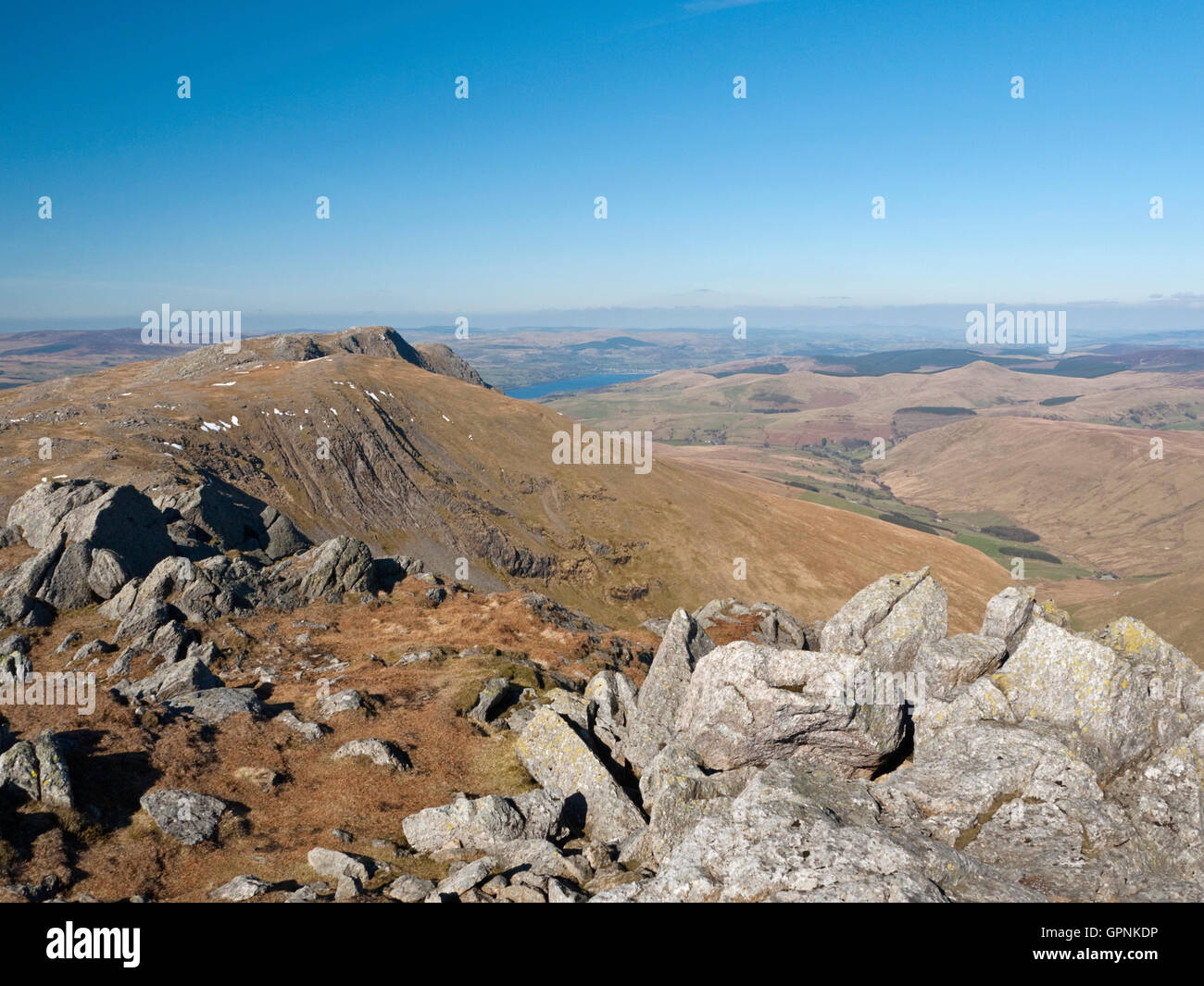 View across Erw y Ddafad-ddu to Aran Benllyn and a distant Lake Bala (Llyn Tegid) from Aran Fawddwy in Snowdonia's Aran range Stock Photo