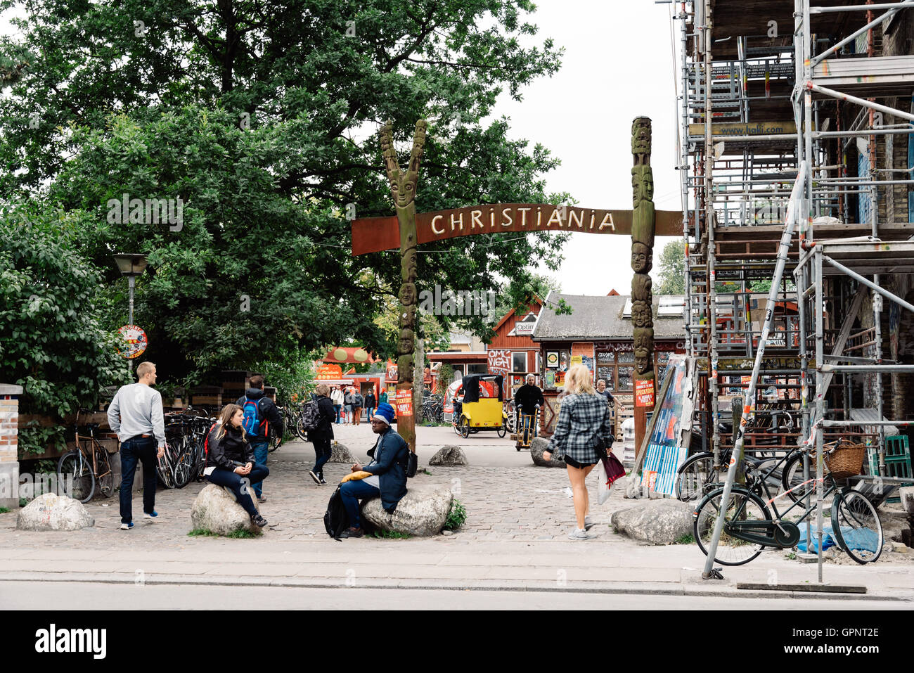Copenhagen, Denmark - August 12, 2016: People at the entrance of Christiania. Also known as Freetown Christiania Stock Photo