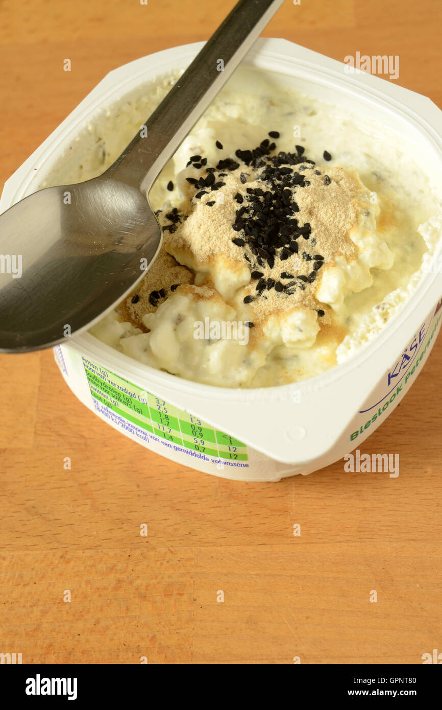 Healthy Snack Of Cottage Cheese Topped With Ashwaganda Powder And
