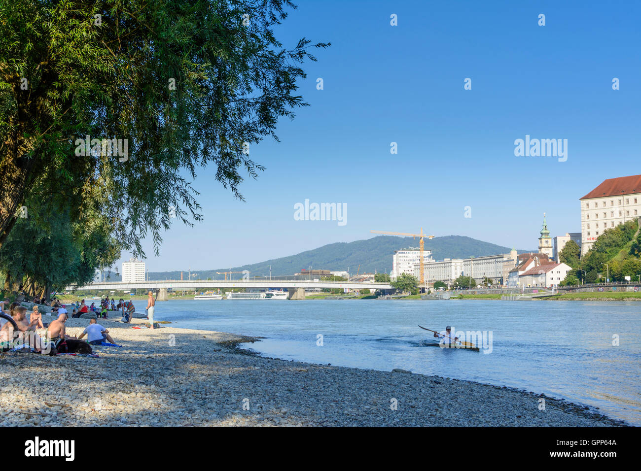 people at beach sunbathing at Danube, Old Town, castle, paddler in Linz, , Oberösterreich, Upper Austria, Austria Stock Photo