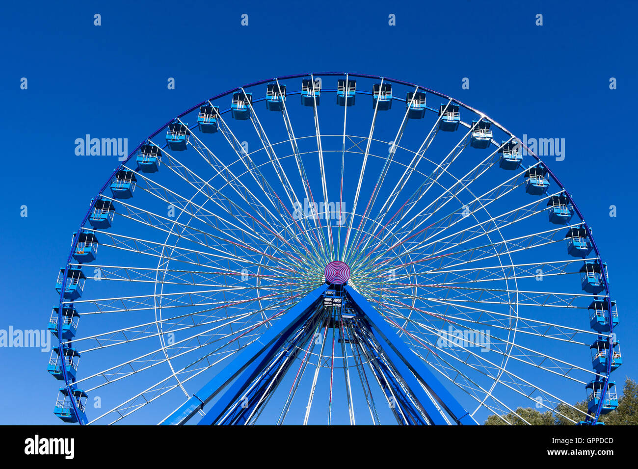 Ferris wheel with blue sky in the background Stock Photo - Alamy