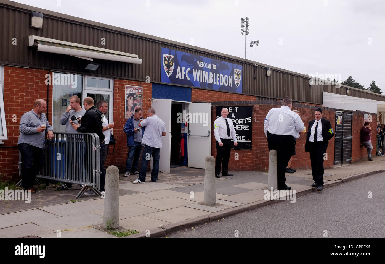 AFC Wimbledon fans outside the Cherry Red Records Stadium Surrey South London UK Stock Photo