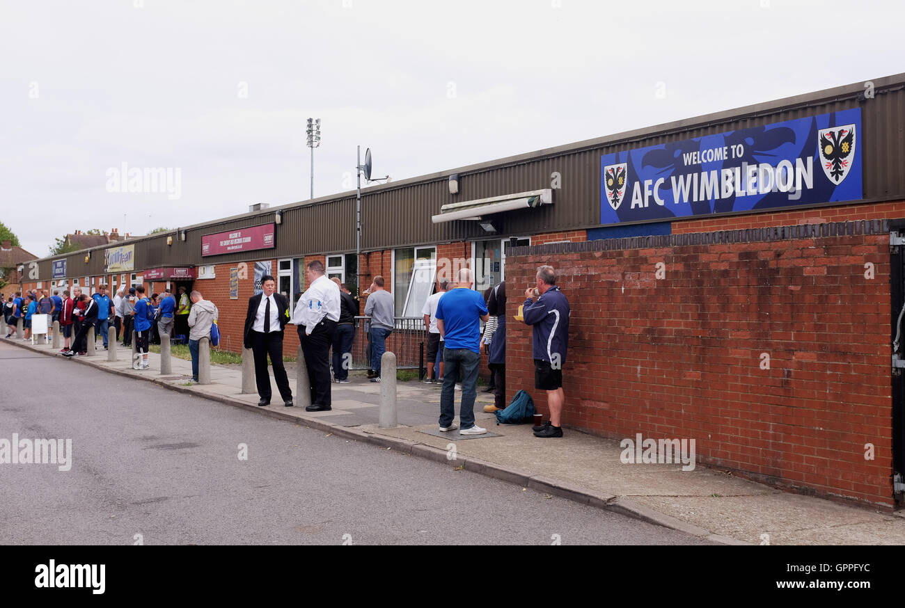 AFC Wimbledon fans outside the Cherry Red Records Stadium Surrey South London UK Stock Photo