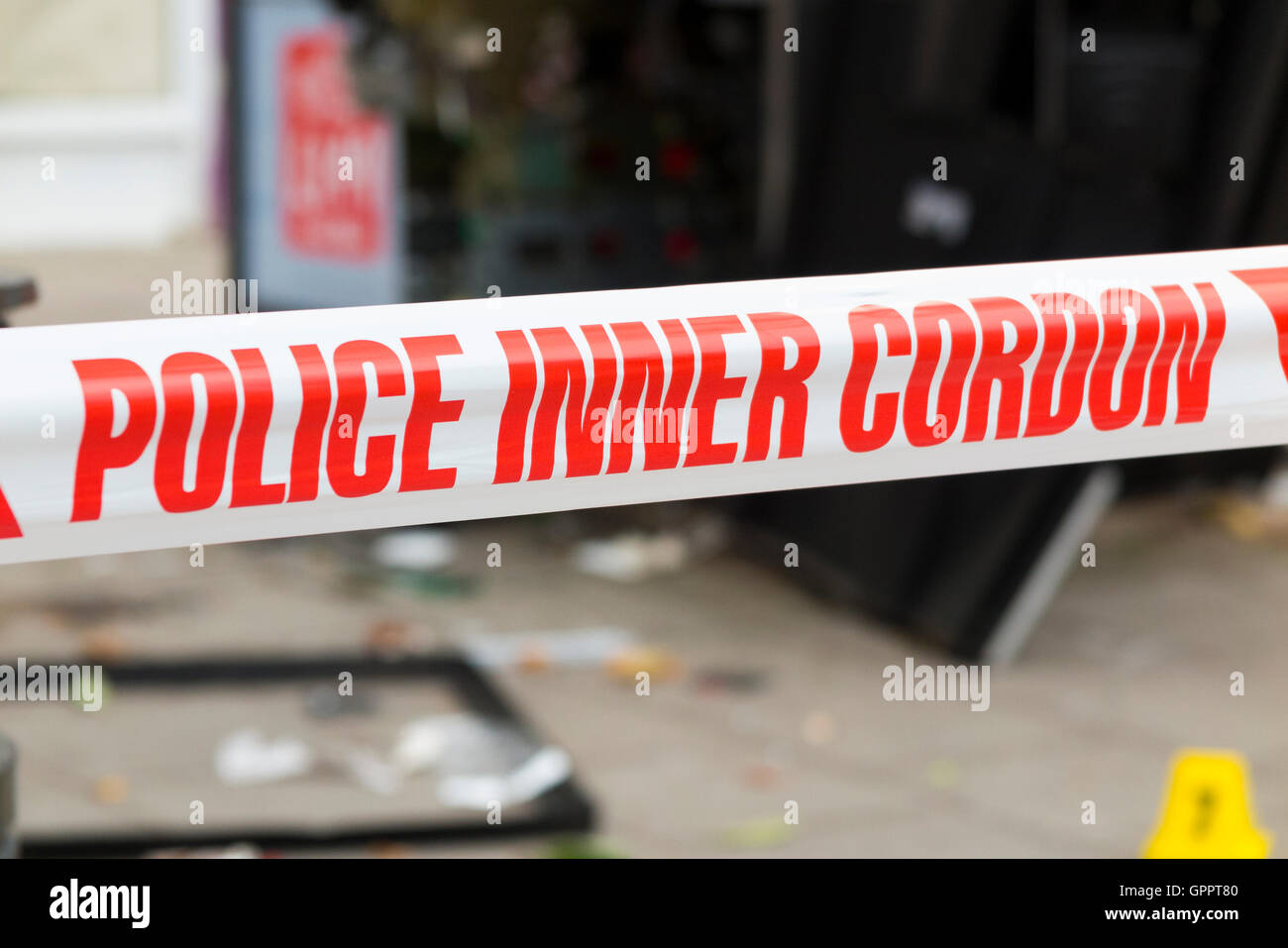 Police inner cordon tape barrier & evidence identification number