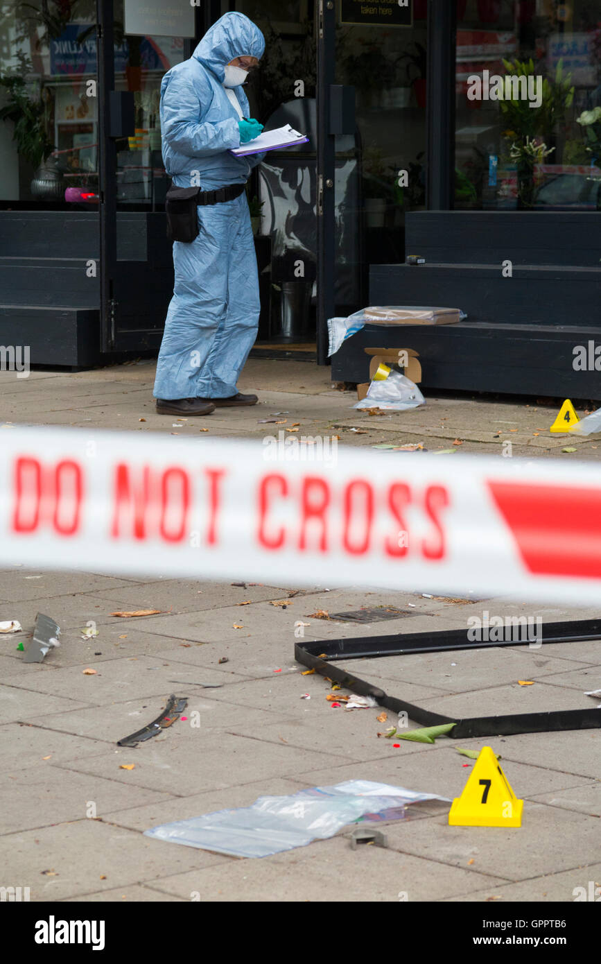 Police do not cross tape barrier & scene of crime officer / crimes
