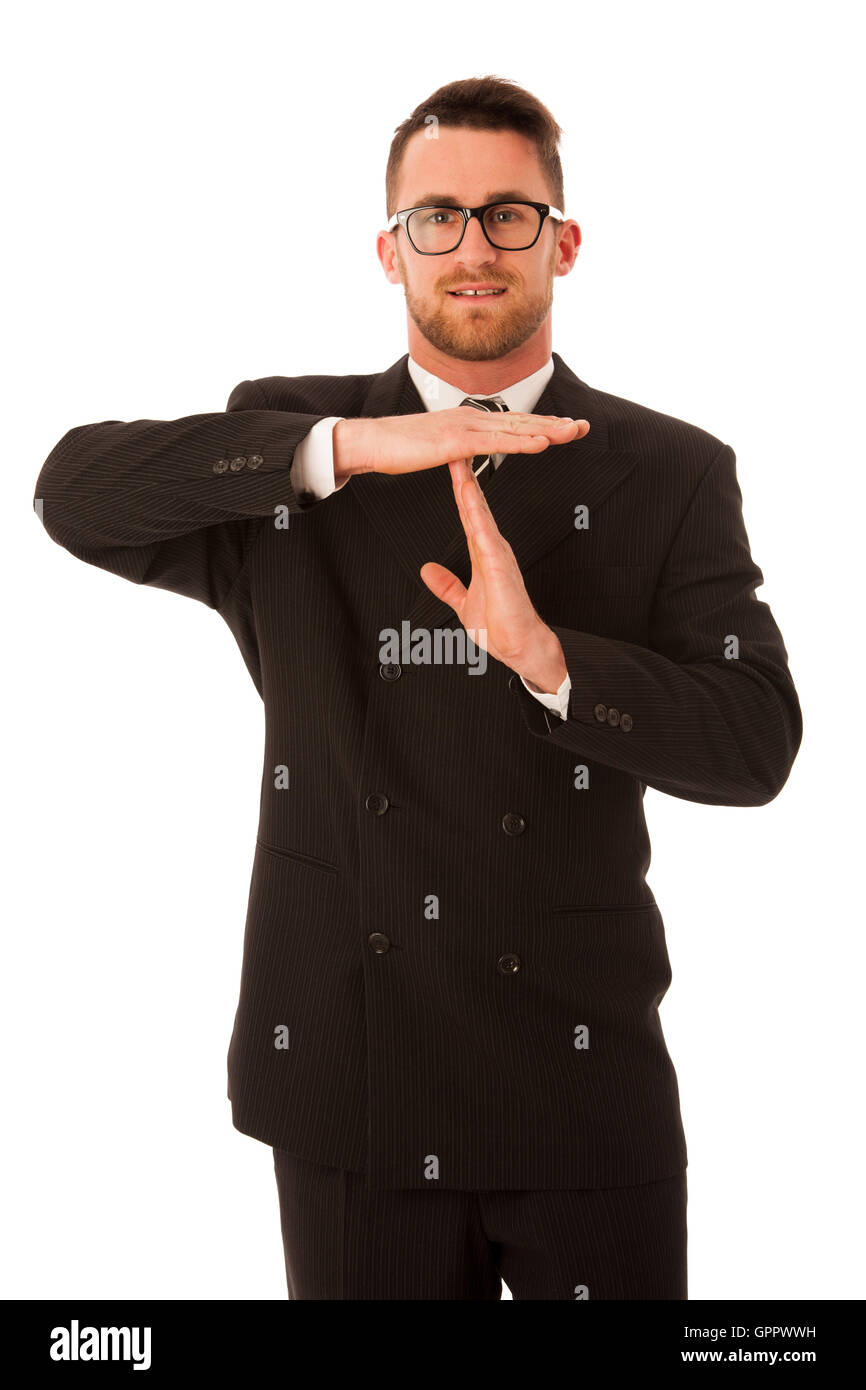 Businessman in formal suit gesturing time out isolated over white background. Stock Photo