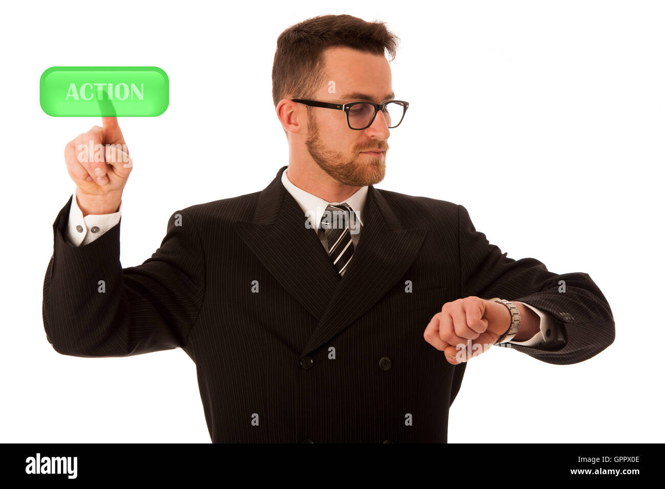 Happy young businessman in suit and tie presenting, promoting, advertising isolated over white. Time for action. Stock Photo