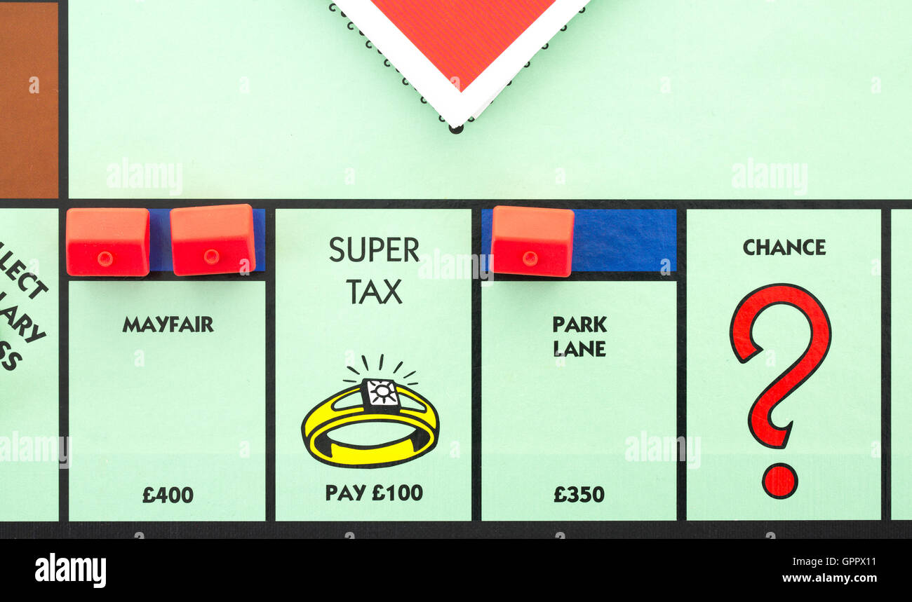 Monopoly Board Game showing Mayfair, Park Lane, Super Tax and Chance. Stock Photo