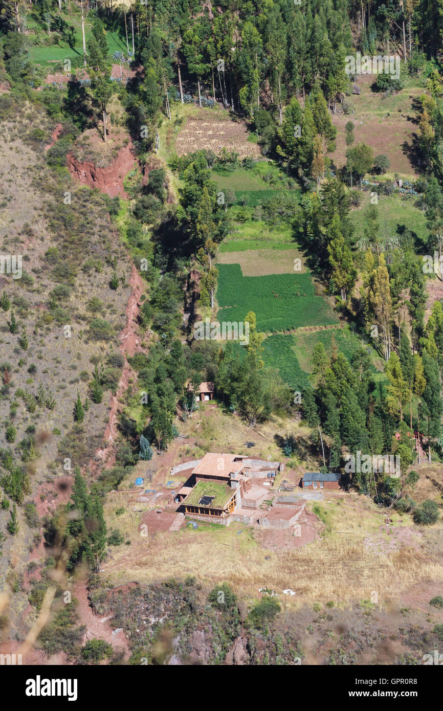 Cusco, Peru - May 15: Small farmhouses views from a distance in the Sacred Valley of the incas, a lifestyle photograph. May 15 2 Stock Photo