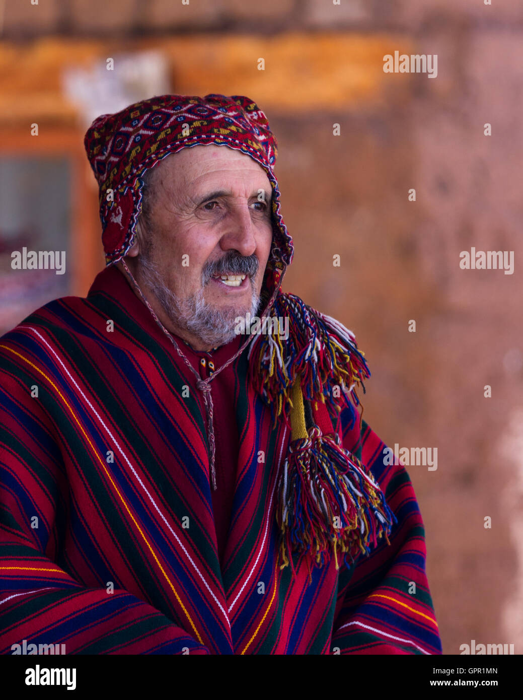 Chinchero Peru -May 18 : Peruvian man wearing traditional colorful clothing. May 18 2016, Chinchero Peru. Stock Photo
