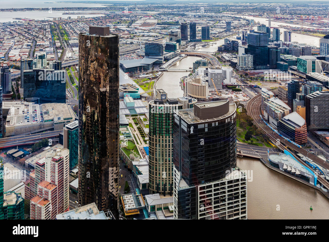Melbourne, Australia - August 27, 2016:  Aerial view of Melbourne CBD with skyscrapers and yarra river winding through. Stock Photo