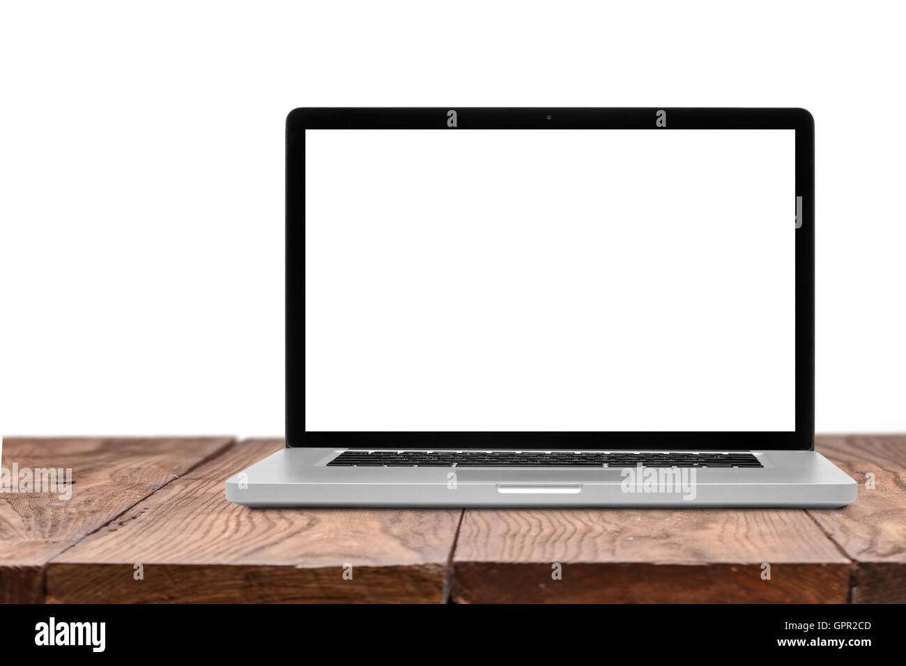 Laptop with blank screen on wooden table isolated Stock Photo - Alamy