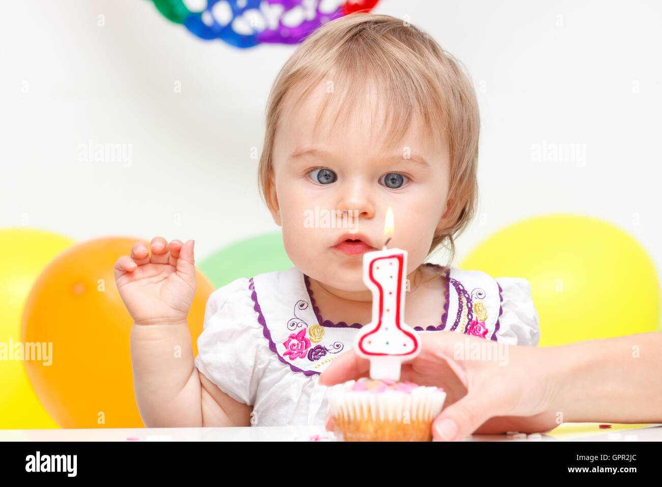 Little girl celebrating first birthday Stock Photo - Alamy