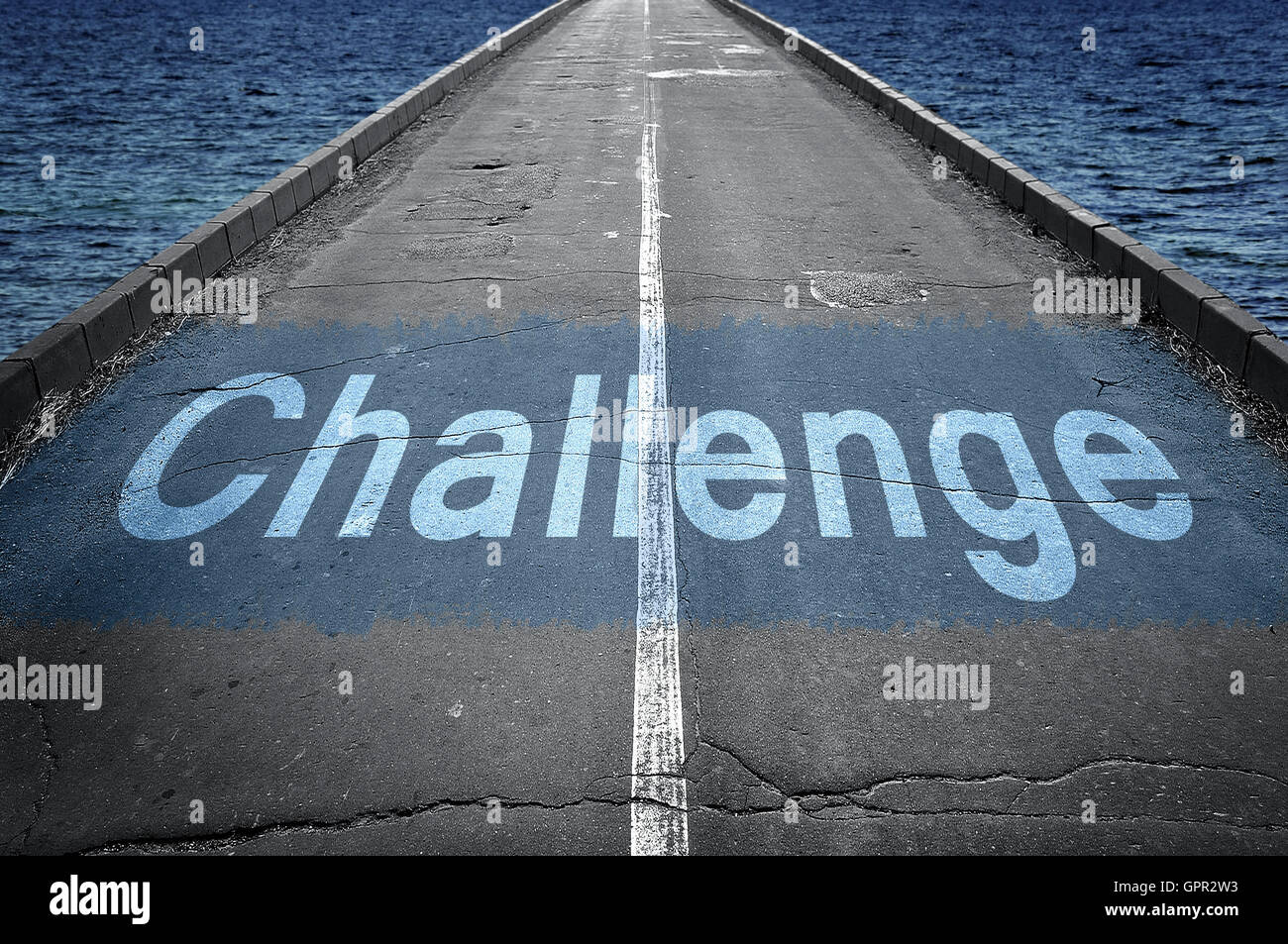 Challenge message on empty road Stock Photo - Alamy