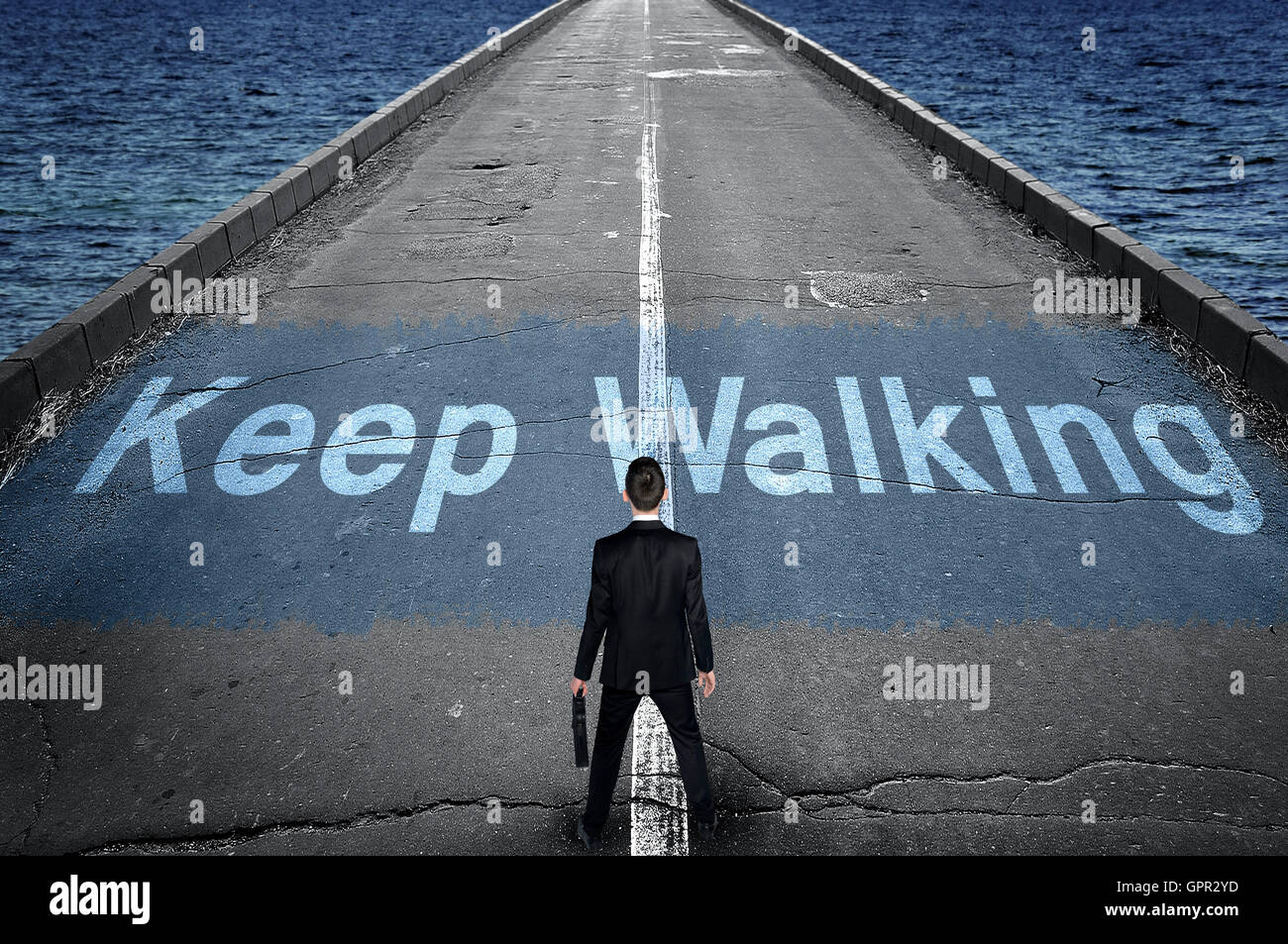 Keep Walking Message On Road And Business Man Stock Photo Alamy Keep Walking Message On Road And Business Man Stock Photo Alamy