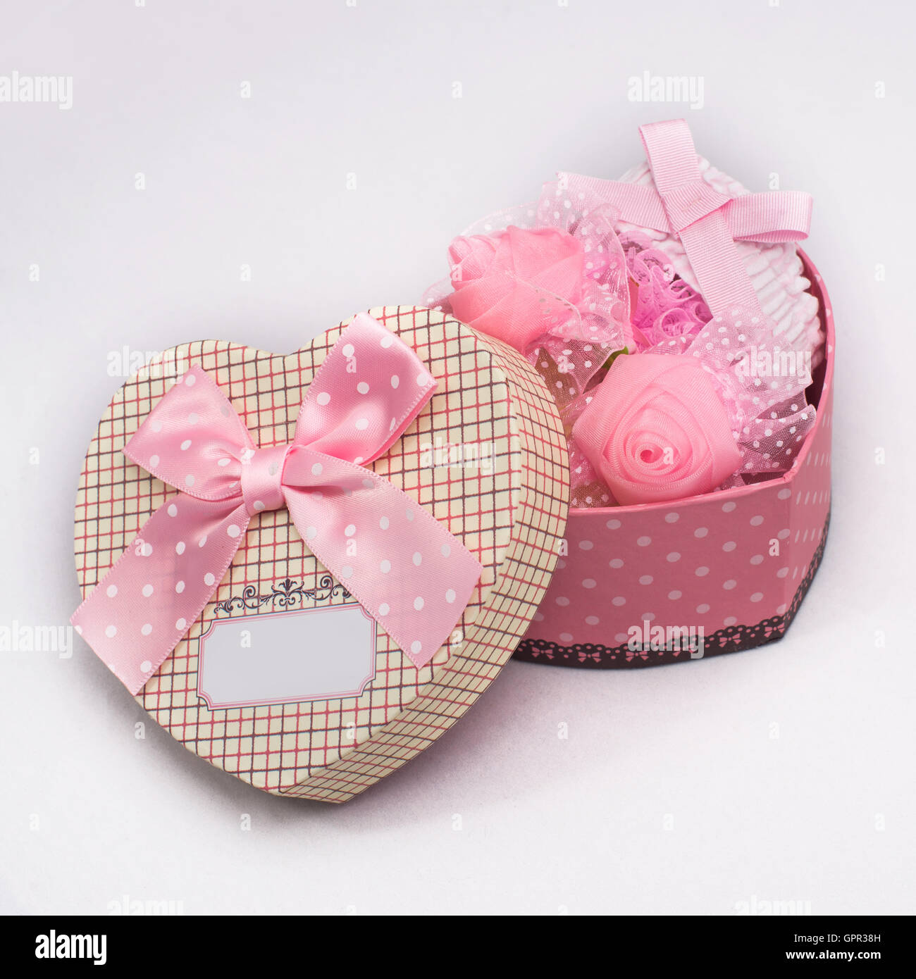 Box as heart with decorations Stock Photo - Alamy