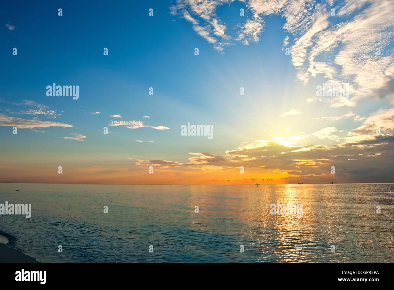 Sunrise over Atlantic ocean Stock Photo - Alamy