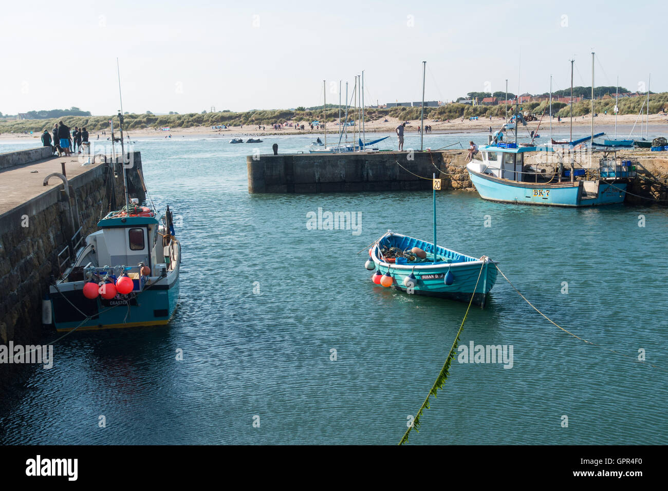 Beadnell harbour, Northumberland, looking towards Beadnell beach and bay Stock Photo