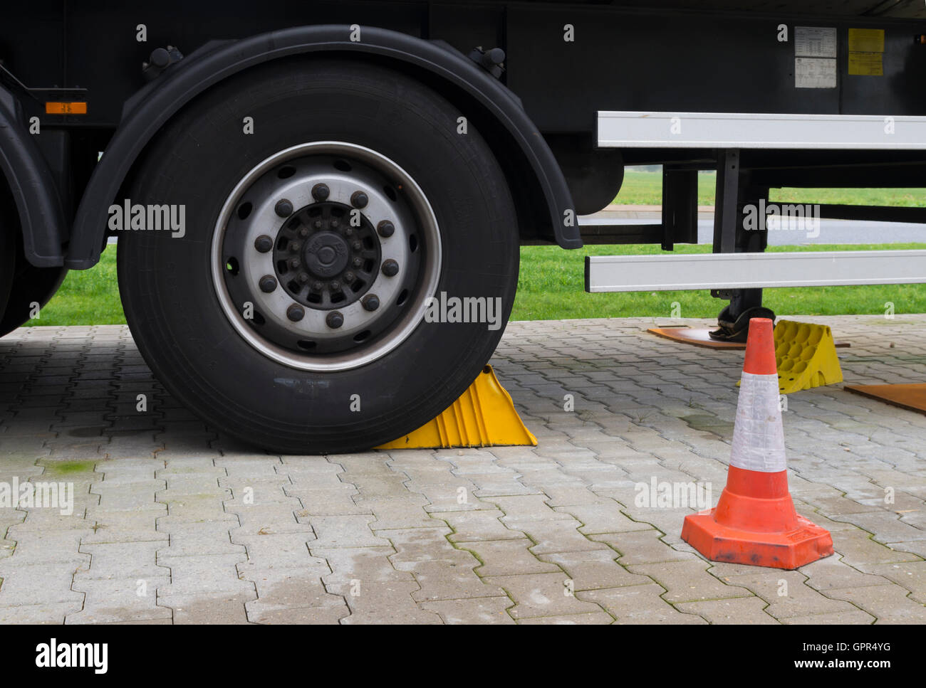parked truck with traffic cone Stock Photo