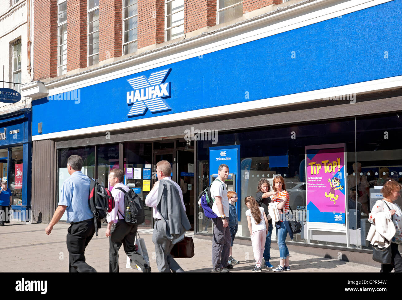 People outside Halifax bank branch exterior York North Yorkshire England UK United Kingdom GB Great Britain Stock Photo