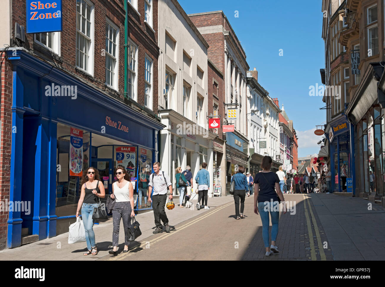 High street shops stores in the city town centre in summer High Ousegate York North Yorkshire England UK United Kingdom GB Great Britain Stock Photo