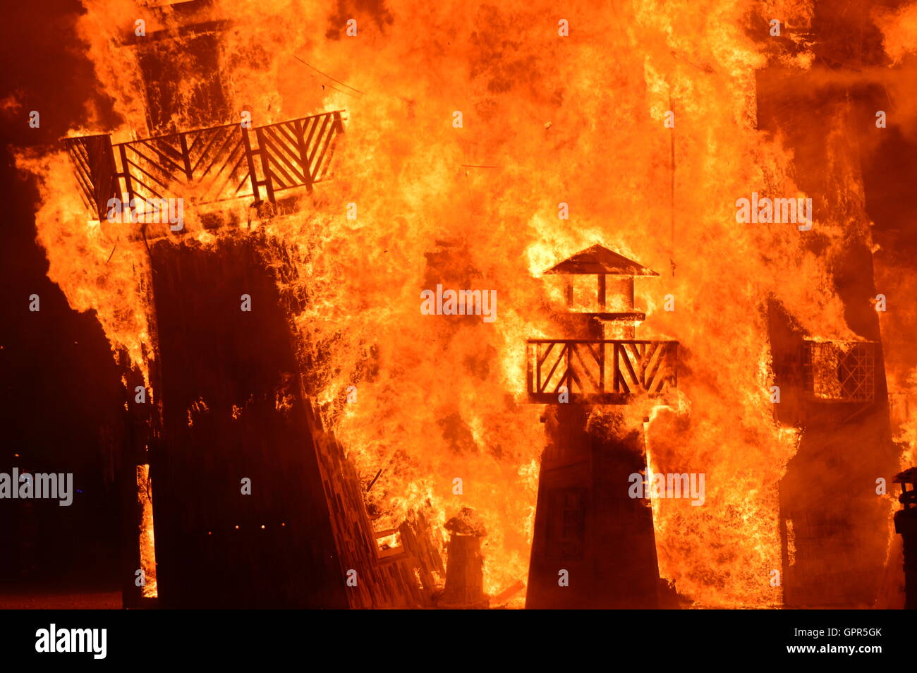 The Lighthouse art display is set fire during the final celebration at the annual desert festival Burning Man September 4, 2016 in Black Rock City, Nevada. Stock Photo