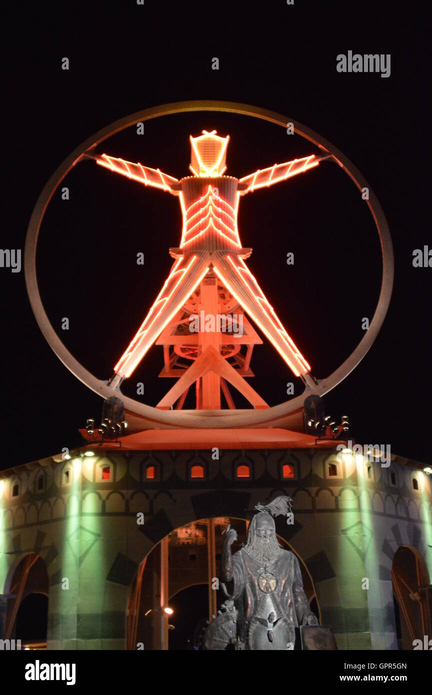 The Burning Man sculpture lights the night sky during the annual desert festival Burning Man