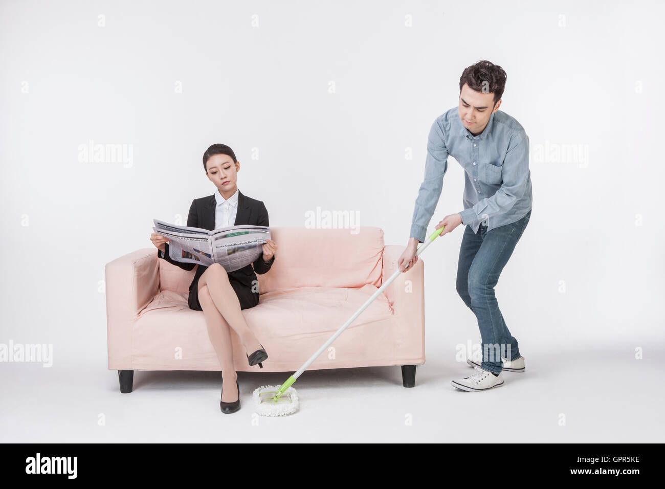 Role reversal young couple hi-res stock photography and images - Alamy