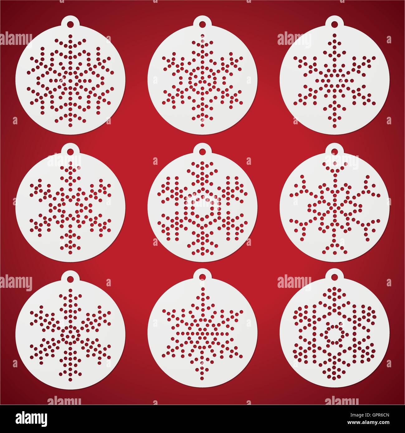 Paper Christmas balls with punched snow flakes Stock Vector