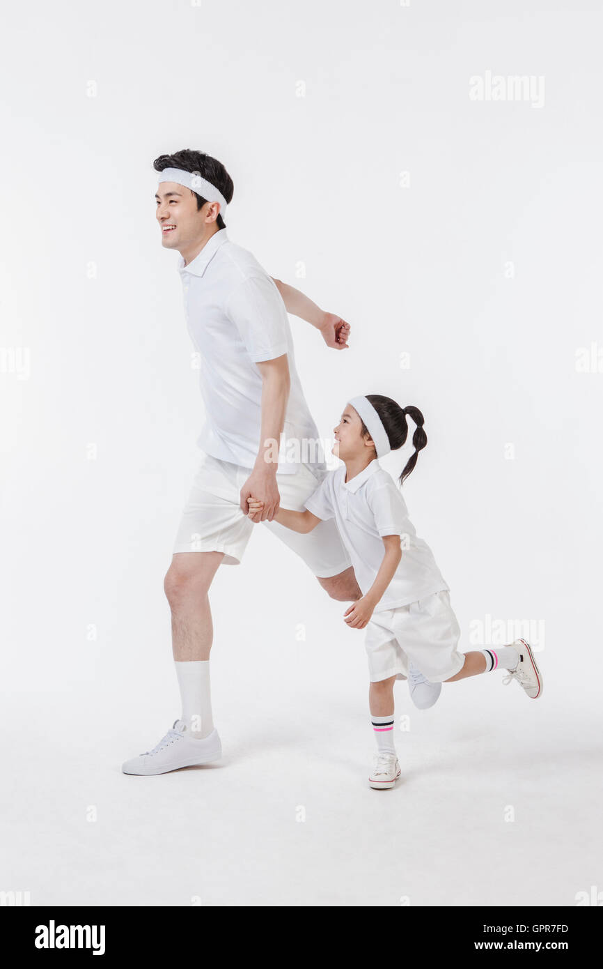 Run With Daughter Rfds Father and daughter running together Stock Photo - Alamy