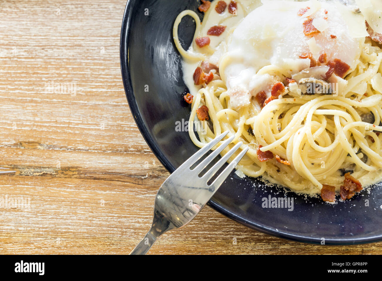 spaghetti carbonara with egg yolk Stock Photo