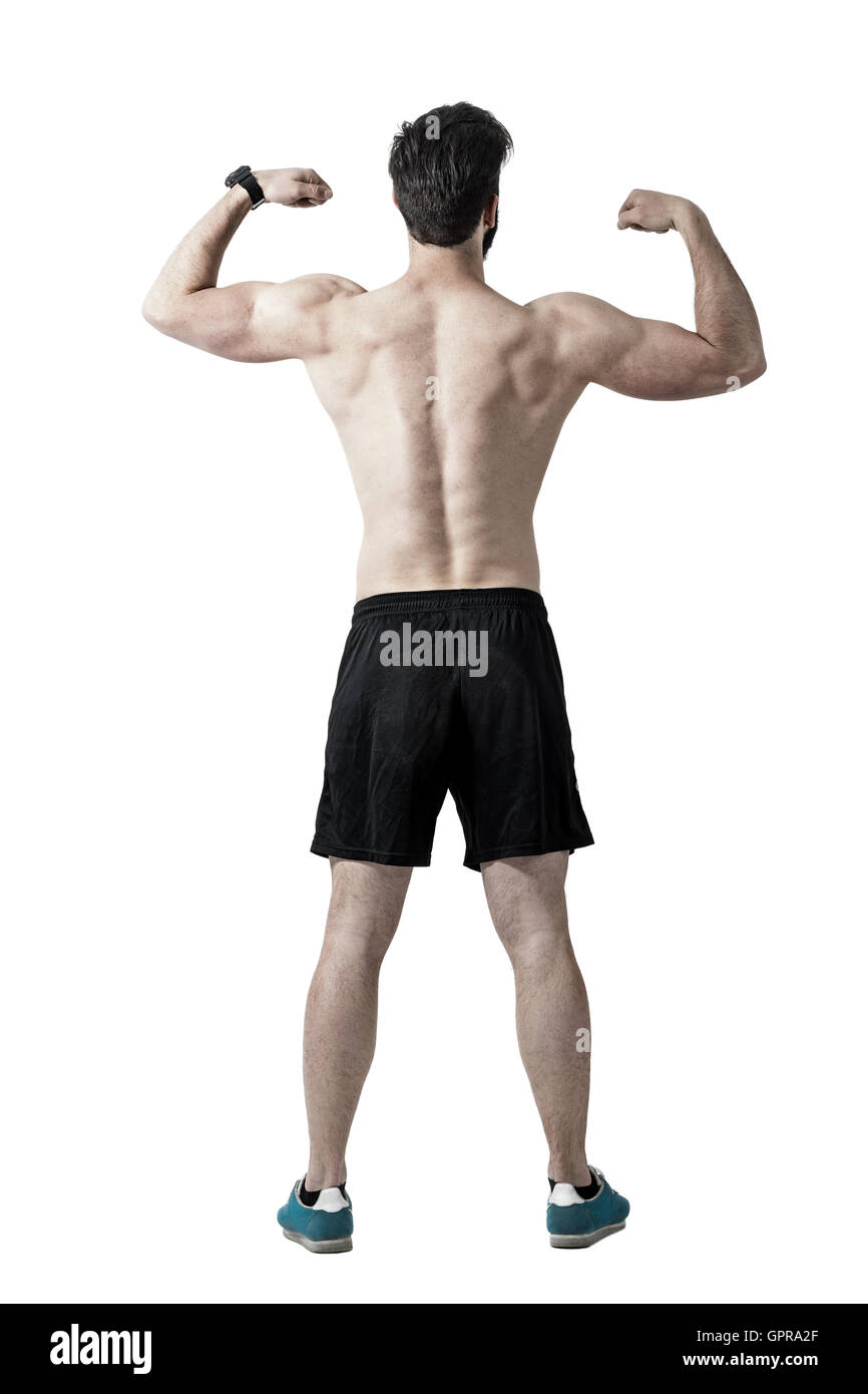 Shirtless athlete flexing back, shoulders and arms rear view. Toned  desaturated full body length portrait isolated on white Stock Photo - Alamy