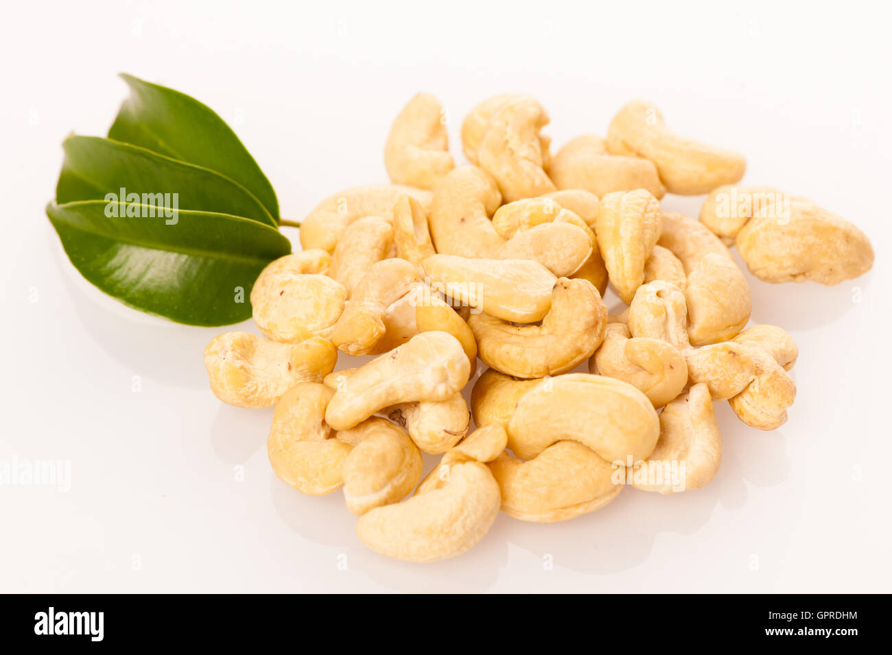 Heap of cashew nuts, healthy snack isolated over white Stock Photo Alamy