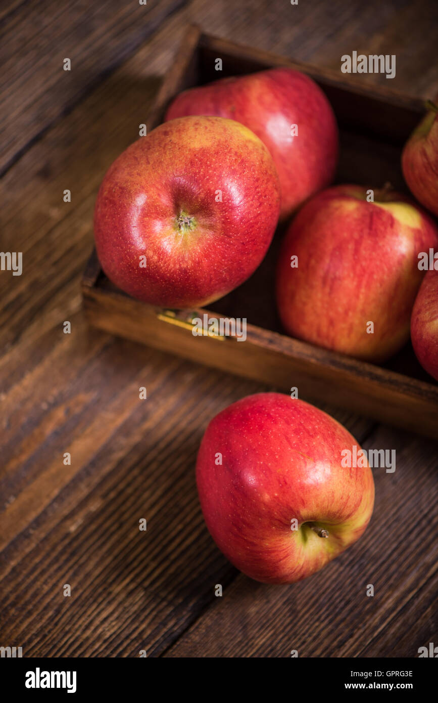 red apple on wooden table, autumn harves Stock Photo