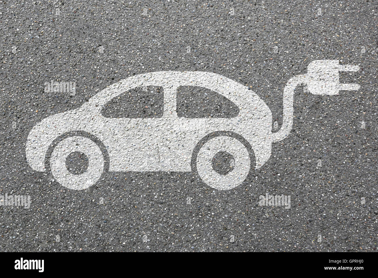 Electric car charging station vehicle street road traffic eco friendly mobility transportation Stock Photo
