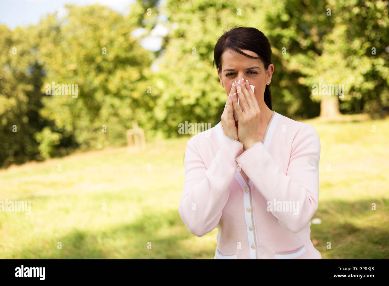 young woman suffering from hay fever Stock Photo