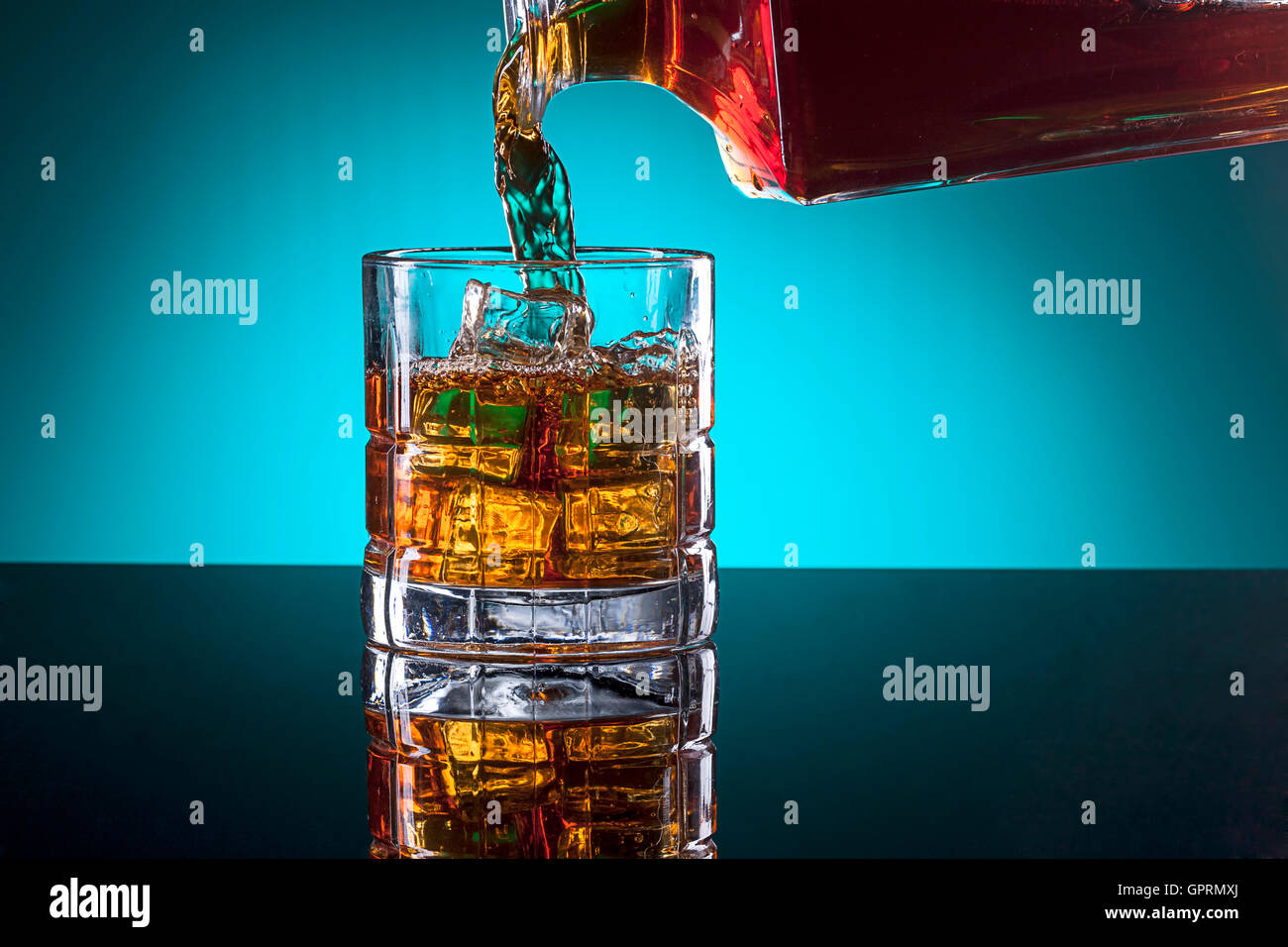 Pouring a drink. Stock Photo