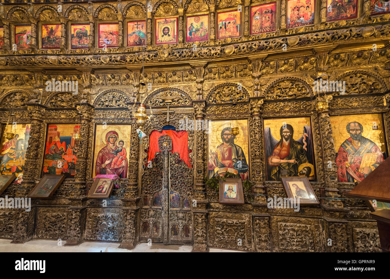 Detail of the carved and guilded iconostasis in the church of Shen Meria, St Marys, Labova near Gjirokaster in Southern Albania Stock Photo