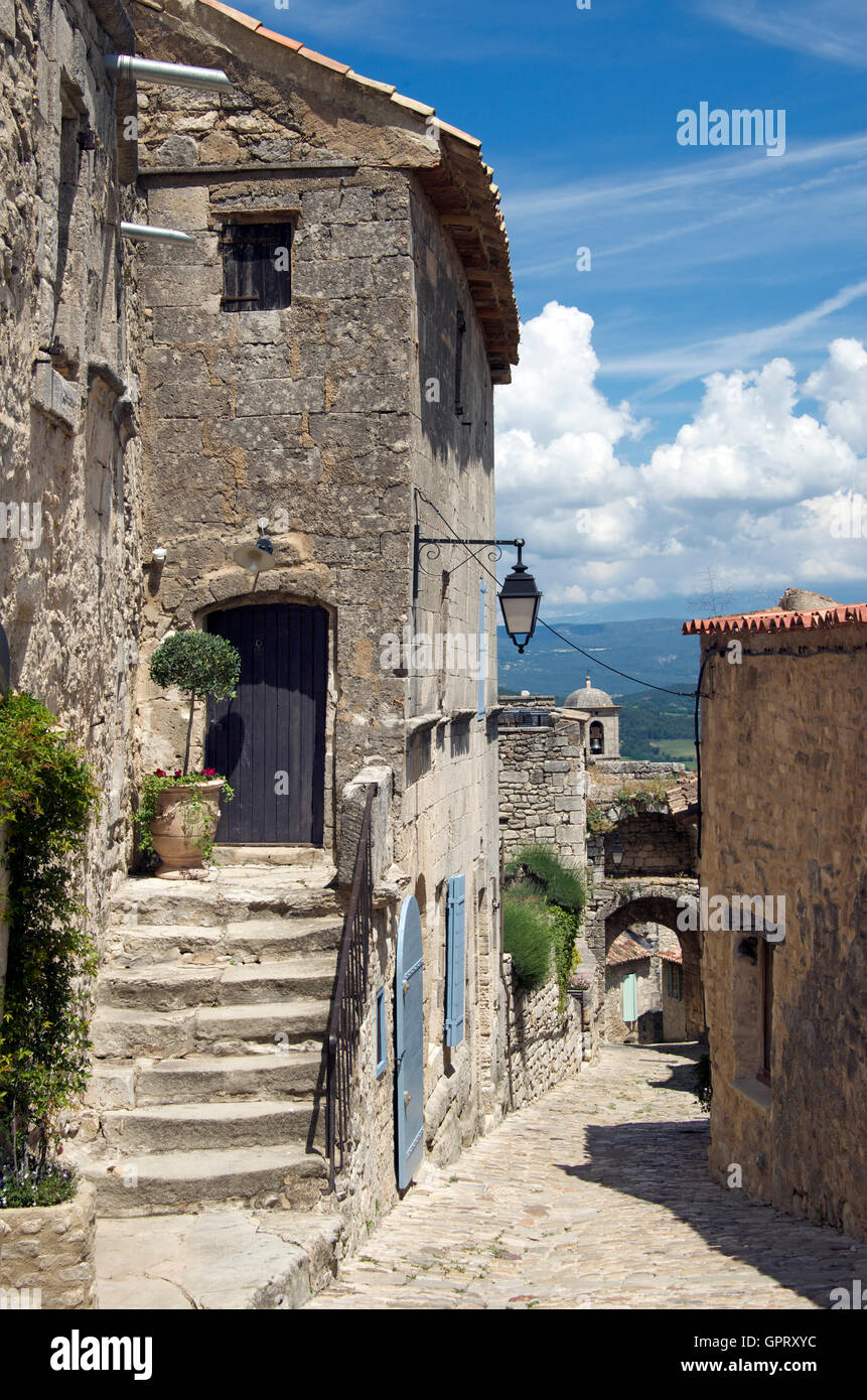 Narrow cobbled lane medieval village Lacoste Luberon Provence France Stock Photo