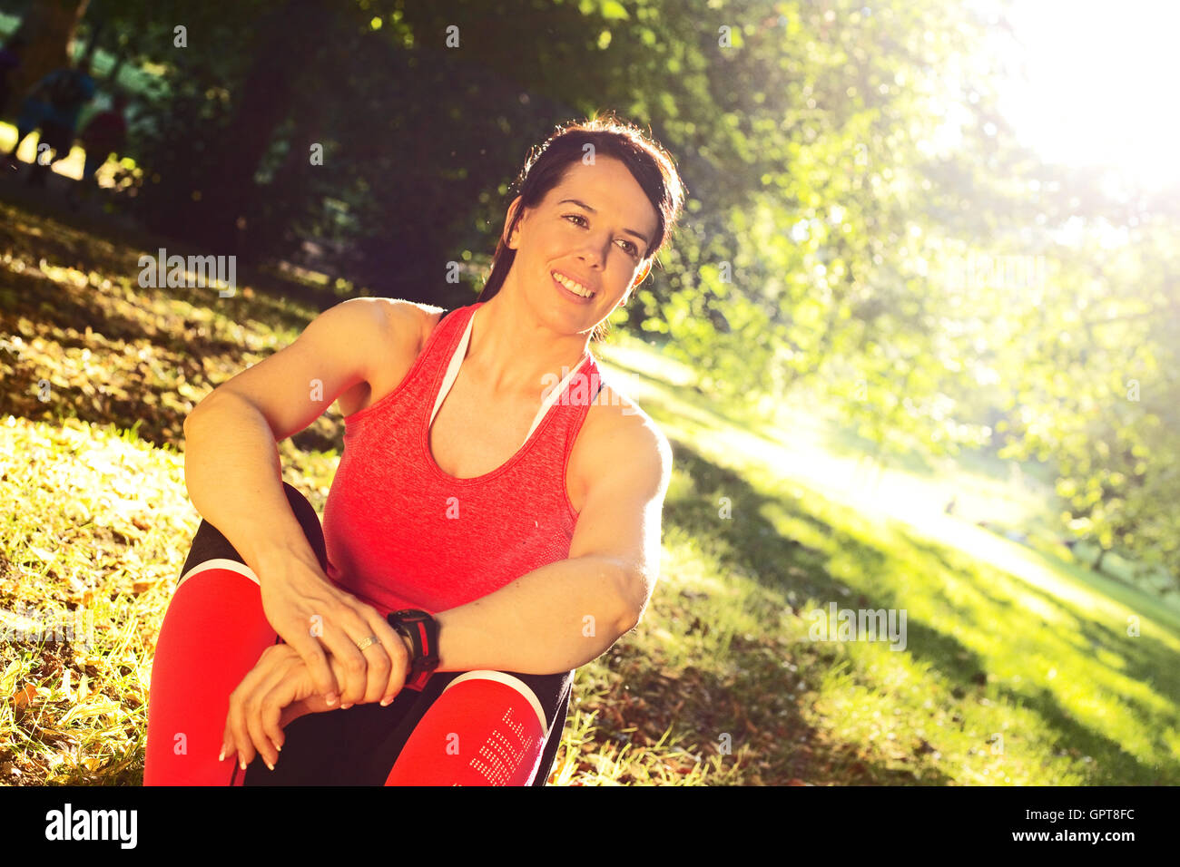 portrait of a fitness woman relaxing after exercise Stock Photo