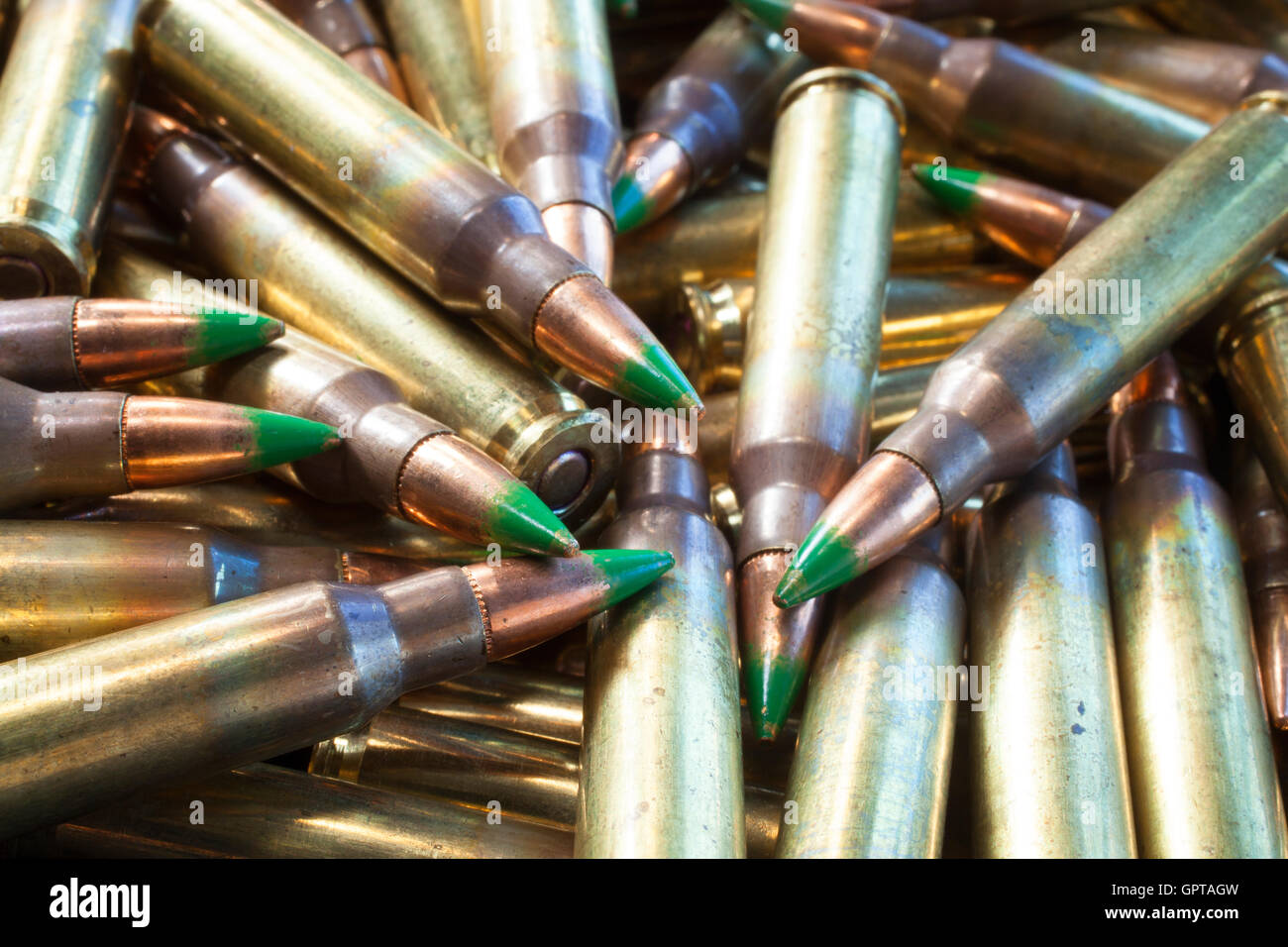 Cartridges designed for a rifle that has bullets with green tips Stock ...